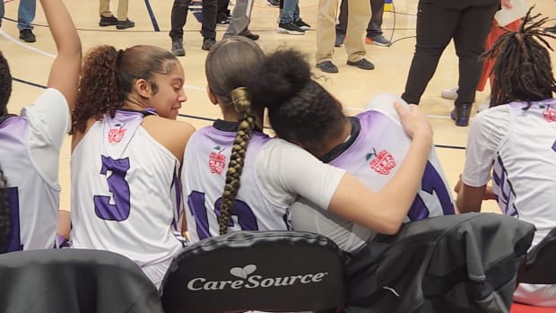 Africentric's Jayona Overby puts her arm around Natiah Nelson after the Lady Nubians won the 2024 OHSAA Division III state championship